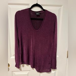 A/X women’s asymmetrical top with zipped sleeves. M